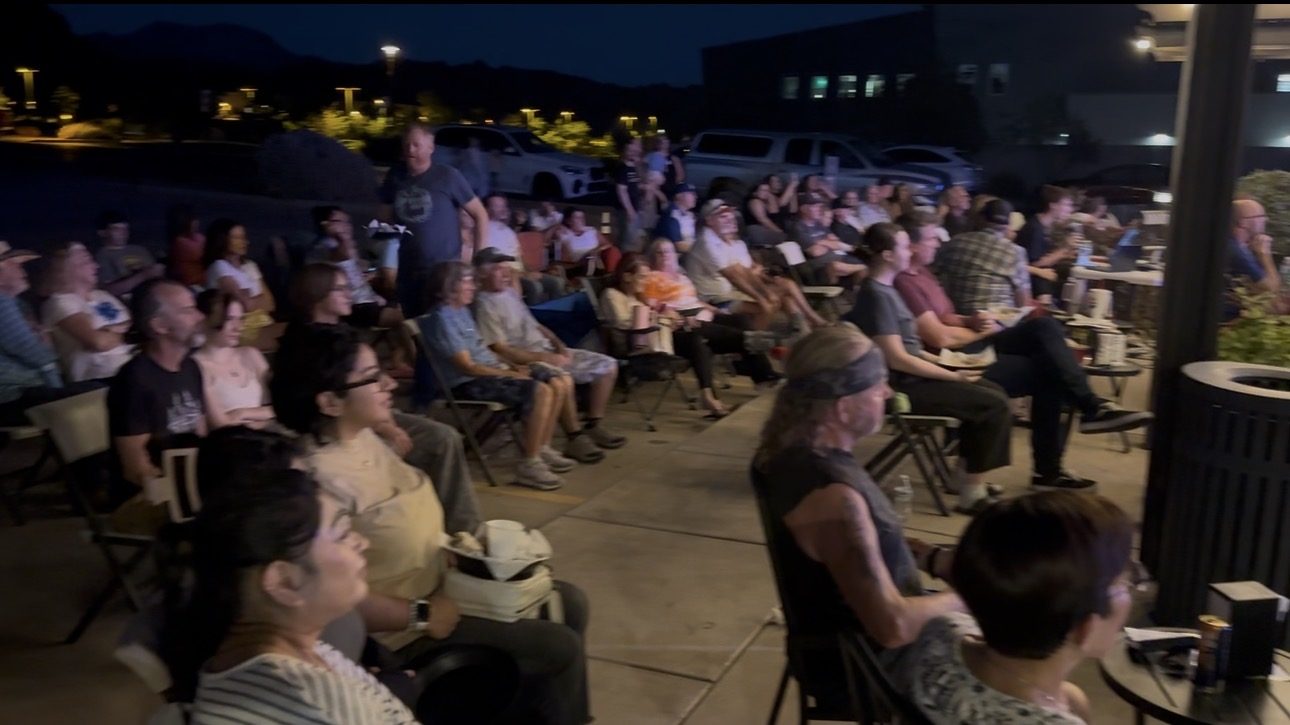 Crowd seated for an evening SUMAC performance